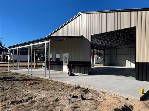 Garage with a wrap around porch