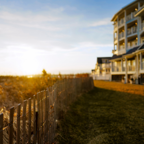 Sun-kissed hotel and beach grass, adjacent to Long Island Sound 