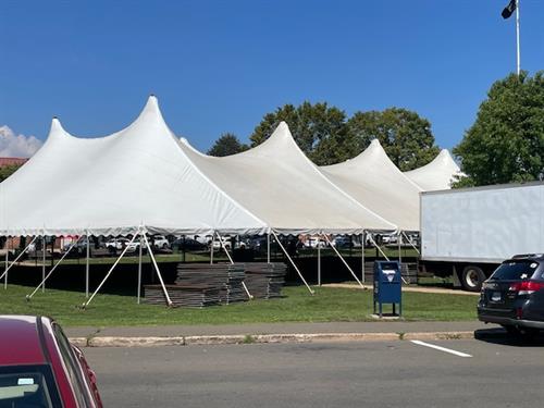 Fall sale tent on Branford Green going up