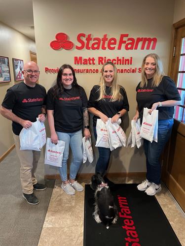 Thank you to our partners at State Farm for packing holiday snack bags. Thank you to our partners at State Farm for packing holiday snack bags.
