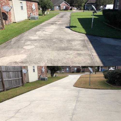 Driveway Cleaning In Homewood, AL. This home owner just moved in and requested the stains to be removed. We utilized our solution to penetrate deep into the concrete and then used a surface cleaner to remove the mold, mildew and grime from everyday use. Customer was extremely happy!
