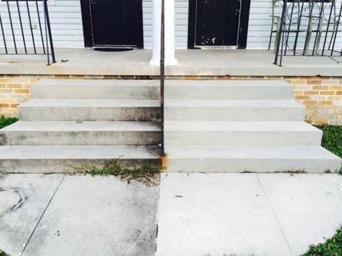 Stairs in Mt. Laurel, AL! This customer was listing the property and wanted some curb appeal. Due to the age of the concrete and the railings we decided to use our soft wash method which utilizes a low pressure rinse after the solution sets on the surface. Tell us what you think? 