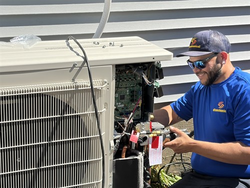 All Mechanical Service technician Bobby S. installing a Mitsubishi Electric ductless heating and cooling system.