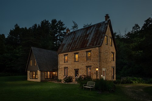 The Brisbane house at dusk. 