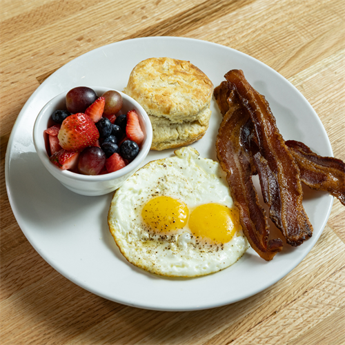 Breakfast Plate with sunny eggs, BBB Original Bacon, biscuit and fresh fruit