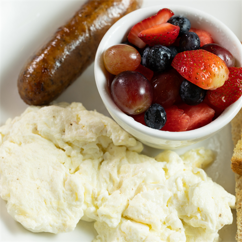 Egg whites, chicken and pork sausage and fresh fruit