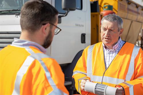 Gallery Image high_vis_close_up_lorry_discussion.jpg