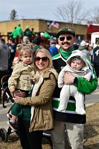 Beautiful family enjoying the Elmhurst St. Patrick Day Parade!