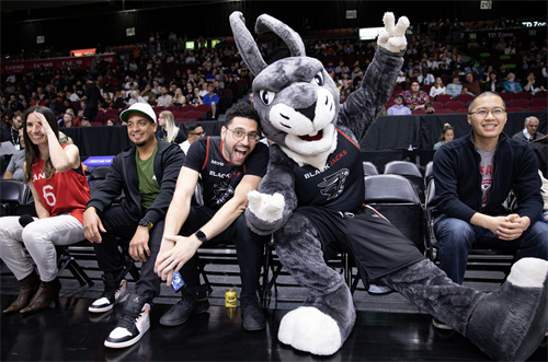 Mascot O.G. with fan