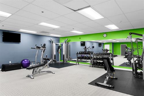 Gym located in the building and is included in any pass or plan purchase