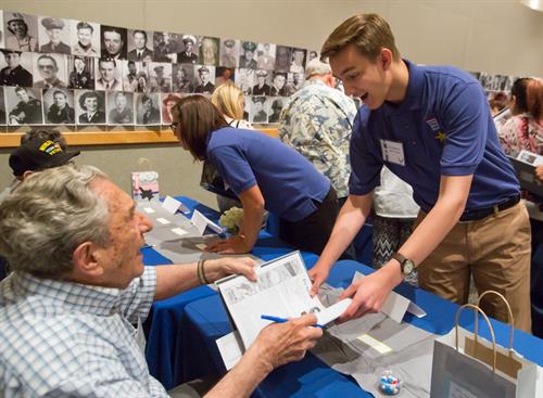 Students host book receptions to honor their veterans