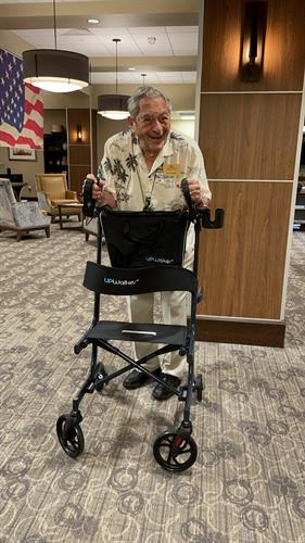 Veteran using his UpWalker to be able to walk a longer distance without tiring as easily.