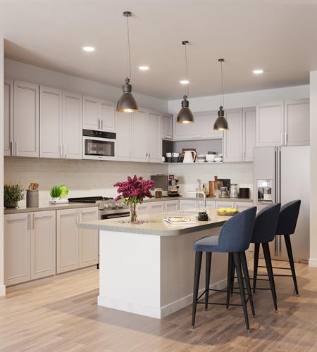 Longleaf offers designer kitchens with backsplash and sleek stainless steel appliances.
