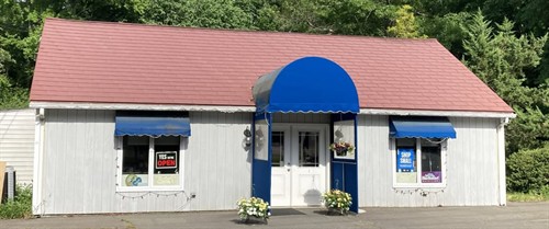 Red roof, blue awnings- easy to find!