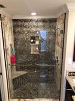 Gallery Image Frameless_swing_shower_door_w_towel_bar_cpull_combo_and_towel_bar_on_the_fixed_panel.jpg