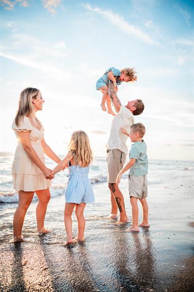 We love photographing stunning family portraits on our beautiful beaches