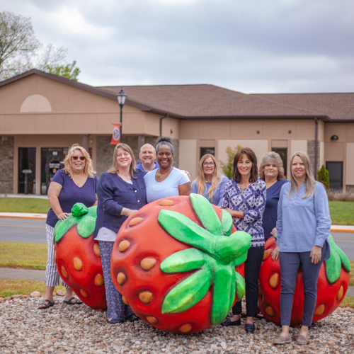 business office employees with strawberries
