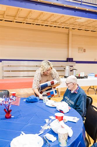 Haley Brazel Photography took photos of Veterans Day Breakfast for the Portland Chamber of Commerce. Pictured is former CEO Sherri and the oldest Veteran in attendance. 