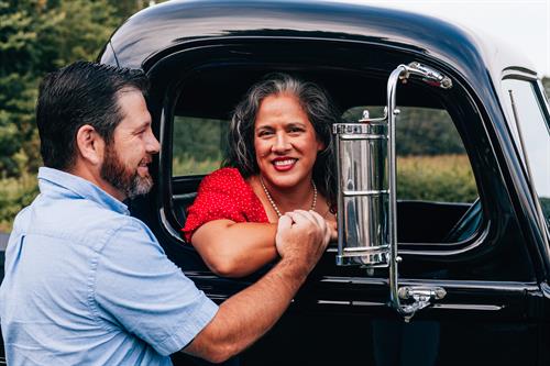Haley Brazel Photography took photos of a couple in an old car in Macon County.
