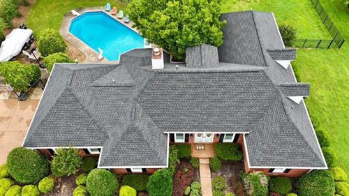 A roof should be just as impressive as the property it protects, and this one was designed to complement every detail of this beautiful home.