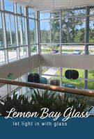 Retail entrance with energy-efficient glass and aluminum framing in Sarasota County, FL. Retail entrance with energy-efficient glass and aluminum framing in Sarasota County, FL.