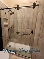 Walk-in Euro Glide glass shower with minimal framing for a spacious modern bath. Walk-in Euro Glide glass shower with minimal framing for a spacious modern bath.