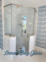 Elegant Neo-angled glass shower doors installed for a bathroom remodel in Englewood, FL. Elegant Neo-angled glass shower doors installed for a bathroom remodel in Englewood, FL.