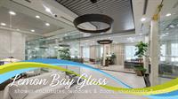 Professional office space in Sarasota featuring floor-to-ceiling interior glass walls and hinged doors by Lemon Bay Glass. Professional office space in Sarasota featuring floor-to-ceiling interior glass walls and hinged doors by Lemon Bay Glass.