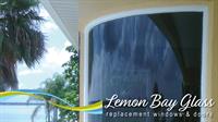 Custom impact-rated curved window installed by Lemon Bay Glass in Sarasota County. Custom impact-rated curved window installed by Lemon Bay Glass in Sarasota County.