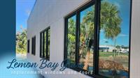 Impact-rated commercial windows installed by Lemon Bay Glass in Sarasota County. Impact-rated commercial windows installed by Lemon Bay Glass in Sarasota County.