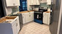 Brand new kitchen we installed before we did backsplash and granite countertops.