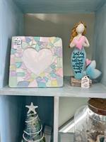 We carry many photo picture frames with beautiful sea glass and seashells limpet Shells, capiza , mother of pearl.driftwood ,also hardwood frames