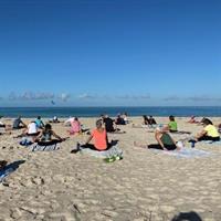 Forward Fold Yoga on Manasota Beach. Every body can do this