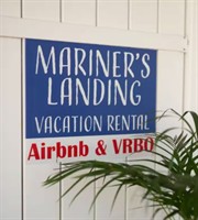 Mariner's Landing, our three bedroom one and half bathroom unit, with overnight dockage and trailer parking for a boat up to 25 ft., and a brand new hot tub with a private deck and fenced in yard.