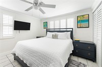 Mariner's Landing, king bedroom with a half bath.