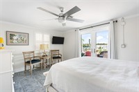 Mariner's Landing, second queen bedroom walking out to the deck and hot tub.