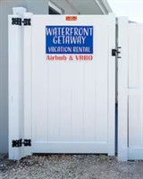 Waterfront Getaway, our two bedroom one bathroom unit, with overnight dockage and trailer parking for a boat up to 25 ft., with a private deck and a fenced in yard.