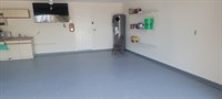 Repainted. The garage and stain. The concrete in Kasey Key.