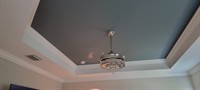 Painted tray ceilings to. Help modernize the look of a home in Englewood.
