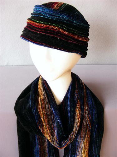 Hand woven rayon (a wood product) chenille hats and scarves since 1991. "Vermeer"