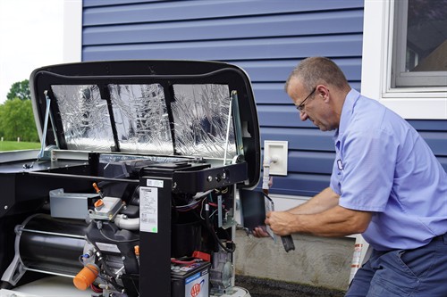 One of our Electricians with a Generator. 