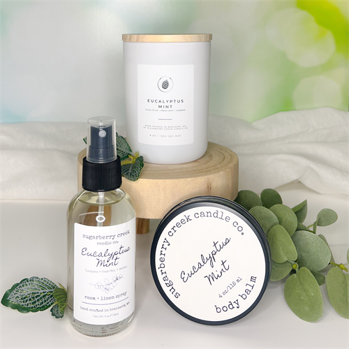 Eucalyptus Mint soy wax candle, room + linen spray and body balm.