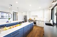 Double Islands in a New Kitchen in St. Michaels designed by Paquin Interiors