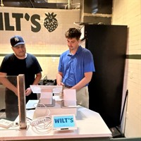 Adam setting up a new POS with the owner