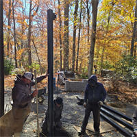 Vinyl & Shade Install Team : Installing the Poles for Shade Sail System