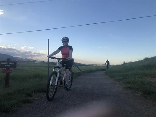 Dr. Jennifer Friedman mountain biking at North table Mountain