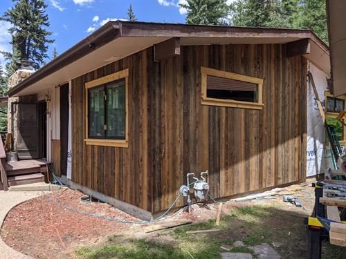 We installed this beautiful siding that was treated to look like reclaimed wood.
