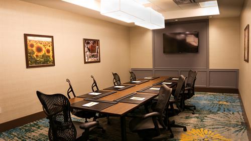 The Ralston Board Room Offers a Permanent Board Room Setting with Built In AV Hook Ups