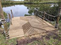 Deck with design and rope railings