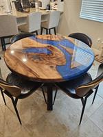 Epoxy and live edge dining table